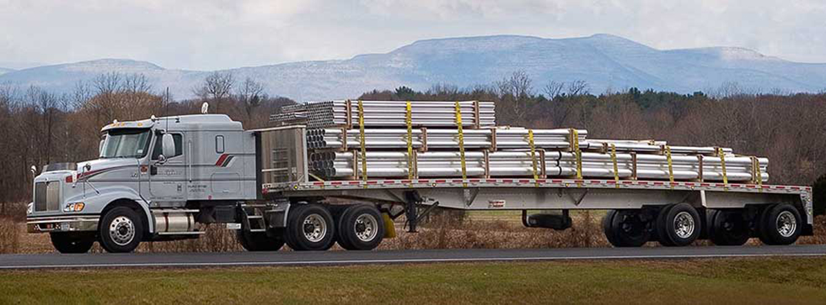 The Importance of Tie and Tarp Services in Flatbed Trucking